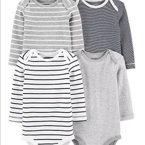 Carter’s 3 month long sleeve body suits 4 pack